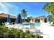 Inviting community pool with plenty of lounge chairs at 3416 W Chelmsford Ct # 2, Sarasota, FL 34235