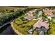 Houses near a lake, showcasing a waterfront community at 348 165Th Ne Ct, Bradenton, FL 34212
