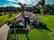 Luxury home with tile roof and lush landscaping at 348 165Th Ne Ct, Bradenton, FL 34212
