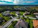 Aerial view of a residential neighborhood with lush landscaping at 348 165Th Ne Ct, Bradenton, FL 34212