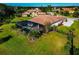Aerial view of home and backyard oasis, showcasing the pool at 348 165Th Ne Ct, Bradenton, FL 34212