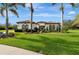 One-story home with tile roof, landscaping and driveway at 348 165Th Ne Ct, Bradenton, FL 34212