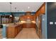 Kitchen with wood cabinets, granite counters, and stainless steel appliances at 348 165Th Ne Ct, Bradenton, FL 34212