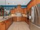 Modern kitchen featuring stainless steel appliances and granite counters at 348 165Th Ne Ct, Bradenton, FL 34212