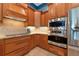 Modern kitchen with granite countertops and stainless steel appliances at 348 165Th Ne Ct, Bradenton, FL 34212