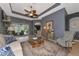 Spacious living room with hardwood floors and access to pool at 348 165Th Ne Ct, Bradenton, FL 34212