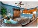 Living room with leather sofas and built-in entertainment center at 348 165Th Ne Ct, Bradenton, FL 34212