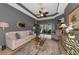 Living room with neutral colored sofas and a view of the pool at 348 165Th Ne Ct, Bradenton, FL 34212