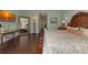 Main bedroom with a large mirror and plenty of natural light at 348 165Th Ne Ct, Bradenton, FL 34212