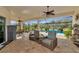 Relaxing patio with pool view and comfortable seating at 348 165Th Ne Ct, Bradenton, FL 34212