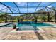 Inviting, screened pool with spa and spacious patio at 348 165Th Ne Ct, Bradenton, FL 34212