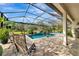 Inviting pool and spa with screened enclosure and ample patio space at 348 165Th Ne Ct, Bradenton, FL 34212