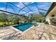 Screened pool and patio area with pavers at 348 165Th Ne Ct, Bradenton, FL 34212