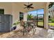Relaxing screened patio with seating area and outdoor storage at 348 165Th Ne Ct, Bradenton, FL 34212