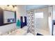 Clean bathroom with tub shower combination and updated fixtures at 3522 Silver Pine Ct # 90, Sarasota, FL 34231
