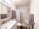 Updated bathroom with walk-in shower and modern vanity at 3522 Silver Pine Ct # 90, Sarasota, FL 34231