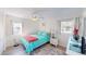 Cozy bedroom with a queen bed and plenty of natural light at 3522 Silver Pine Ct # 90, Sarasota, FL 34231