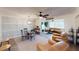Bright dining area with seating for four and open to living room at 3522 Silver Pine Ct # 90, Sarasota, FL 34231