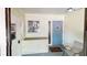 Bright and welcoming entryway with storage and seating at 3522 Silver Pine Ct # 90, Sarasota, FL 34231