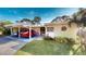 Updated condo with carport parking and tropical landscaping at 3522 Silver Pine Ct # 90, Sarasota, FL 34231