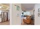 Open concept living area with stylish furniture and hardwood floors at 3522 Silver Pine Ct # 90, Sarasota, FL 34231