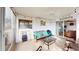 Relaxing sunroom with glass enclosure and outdoor access at 3522 Silver Pine Ct # 90, Sarasota, FL 34231