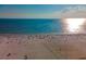 Beachfront property with many people at 378 Golden Gate Pt # 6, Sarasota, FL 34236