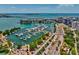 Drone view of waterfront community with marina at 378 Golden Gate Pt # 6, Sarasota, FL 34236