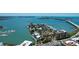 Aerial view of waterfront homes and marina at 378 Golden Gate Pt # 6, Sarasota, FL 34236