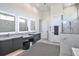 Spa-like bathroom with marble finishes and double vanity at 3939 Higel Ave, Sarasota, FL 34242
