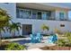 Modern home with a patio and well-manicured landscaping at 3939 Higel Ave, Sarasota, FL 34242