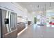 Sleek kitchen featuring stainless steel appliances and a large island at 3939 Higel Ave, Sarasota, FL 34242