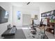 Modern home office, featuring a desk and comfortable seating at 3939 Higel Ave, Sarasota, FL 34242