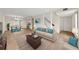 Living Room with staged furniture and tile floors at 4001 Beneva Rd # 304, Sarasota, FL 34233