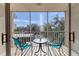 Private balcony with seating for two, overlooking a tranquil view at 4110 Ironwood Cir # 301, Bradenton, FL 34209