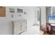 Entryway with a console table, beach decor, and a view to the back door at 4110 Ironwood Cir # 301, Bradenton, FL 34209