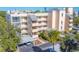 Tan three-story building with parking at 4110 Ironwood Cir # 301, Bradenton, FL 34209