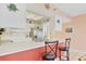 Updated kitchen featuring stainless steel appliances and a breakfast bar at 4110 Ironwood Cir # 301, Bradenton, FL 34209