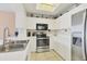 Clean and efficient kitchen with stainless steel appliances at 4110 Ironwood Cir # 301, Bradenton, FL 34209