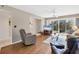 Living room with hardwood floors, comfortable seating, and coastal decor at 4110 Ironwood Cir # 301, Bradenton, FL 34209