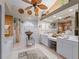 Spa-like bathroom with double vanity and glass block wall at 4472 Via Del Villetti Dr, Venice, FL 34293