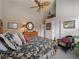 Guest bedroom with floral bedding and sitting chair at 4472 Via Del Villetti Dr, Venice, FL 34293