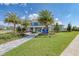 Community clubhouse with landscaping and walkway at 4514 Big Woods Way, Parrish, FL 34219