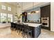 Modern community kitchen with an island and stainless steel appliances at 4514 Big Woods Way, Parrish, FL 34219