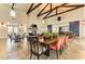 Community room with exposed beams, farmhouse style tables and chairs at 4514 Big Woods Way, Parrish, FL 34219