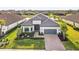 Luxury home with driveway and landscaping at 4534 Trento Pl, Bradenton, FL 34211