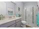 Bathroom with walk-in shower, modern vanity, and stylish decor at 4534 Trento Pl, Bradenton, FL 34211