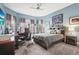 Comfortable bedroom with a built-in desk and TV at 4534 Trento Pl, Bradenton, FL 34211