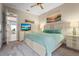 Spacious bedroom with a king-size bed and ensuite access at 4534 Trento Pl, Bradenton, FL 34211