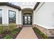 Double-door entry with glass accents and brick walkway at 4534 Trento Pl, Bradenton, FL 34211